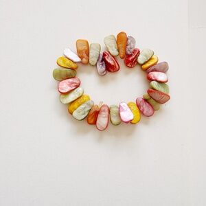 An abalone shell elastic bracelet, 6.75 inches.